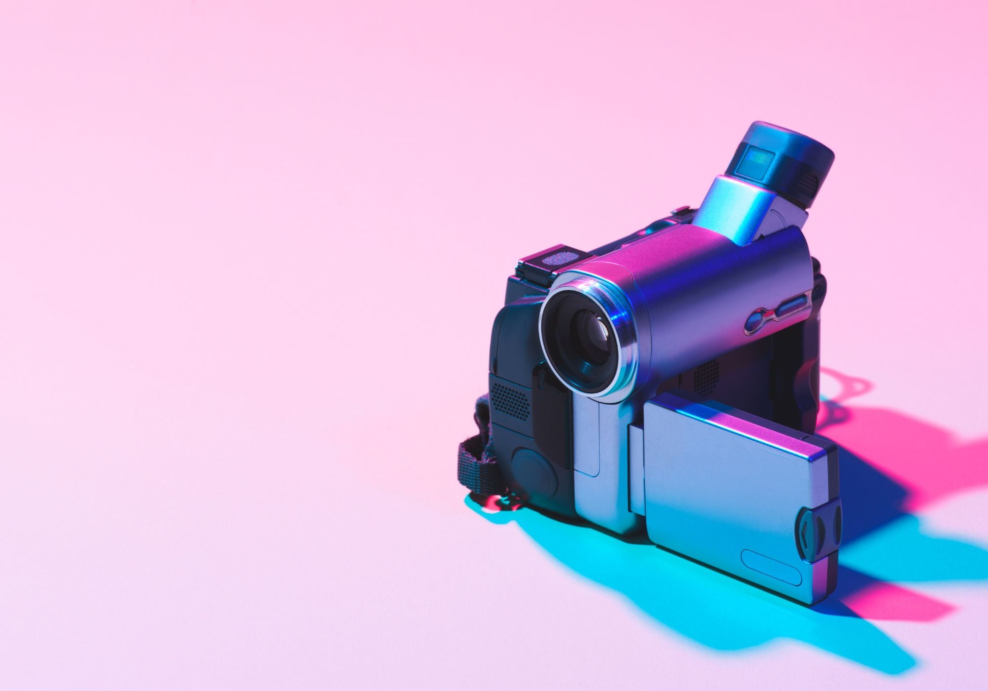 camcorder on pink background