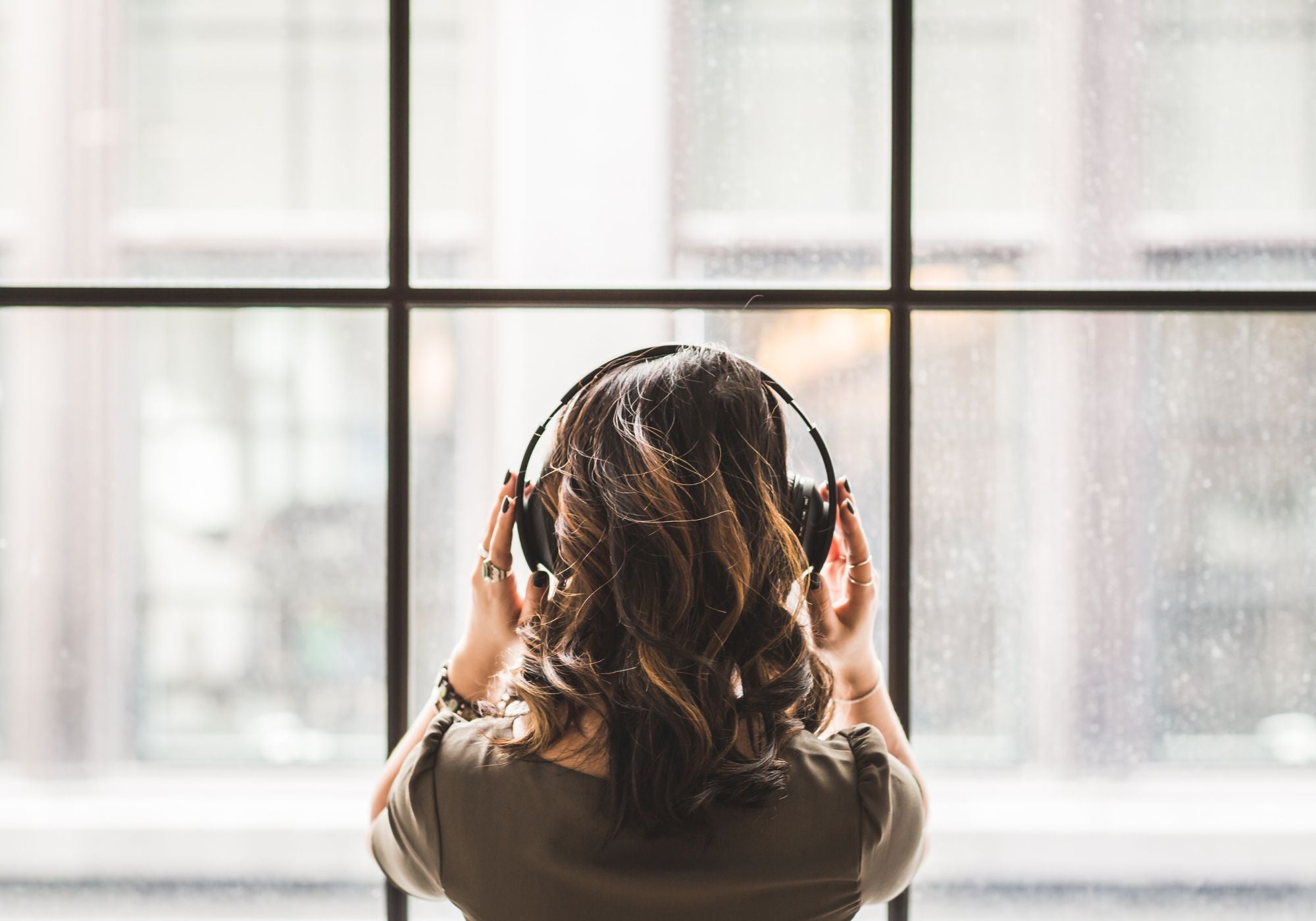 woman listening to headphones