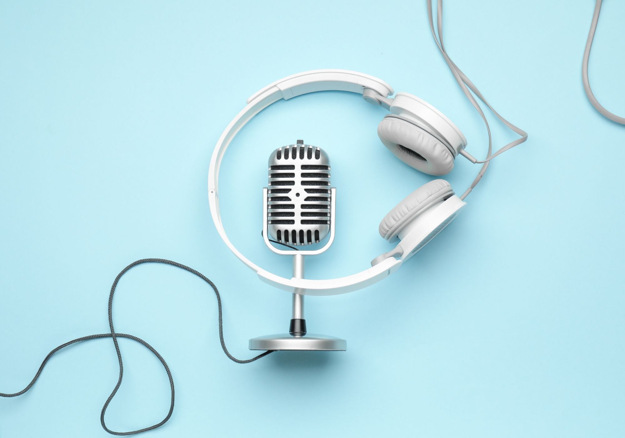 microphone and headphones on blue background