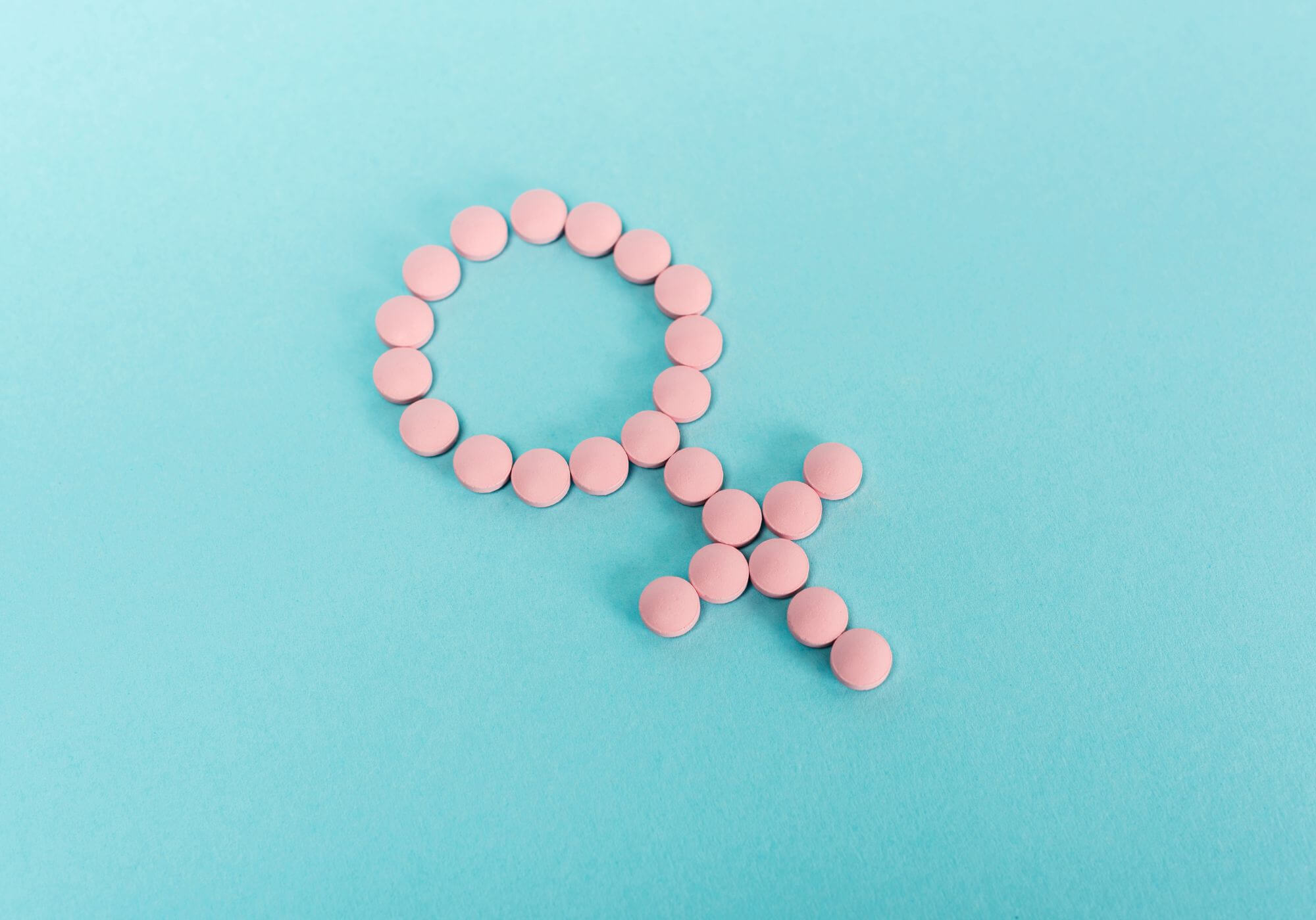 pills in shape of female symbol